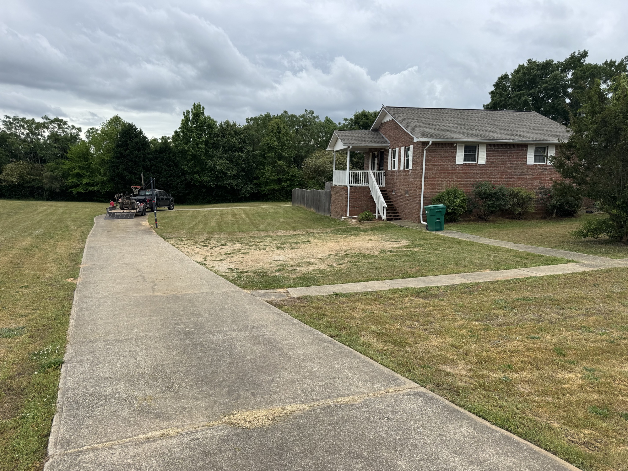 After: large lawn mowed clean with stripes